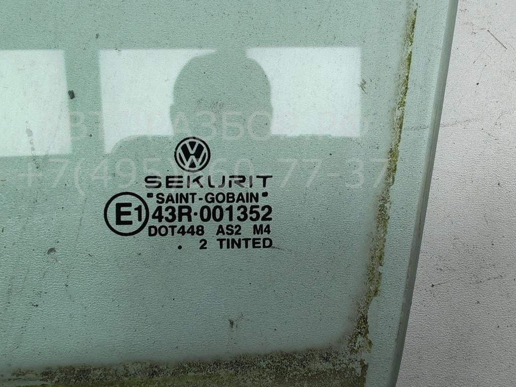 Стекло двери задней левой
