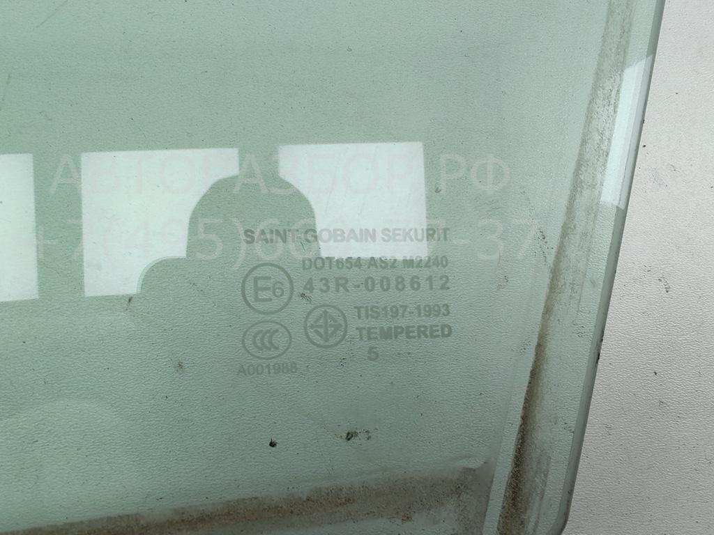Стекло двери передней левой