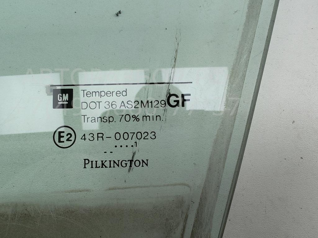 Стекло двери передней левой