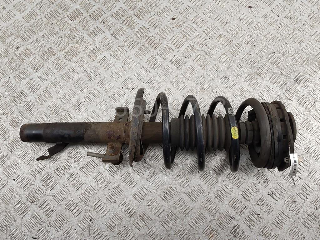 Амортизатор передний левый