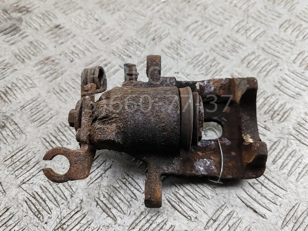 Суппорт задний левый