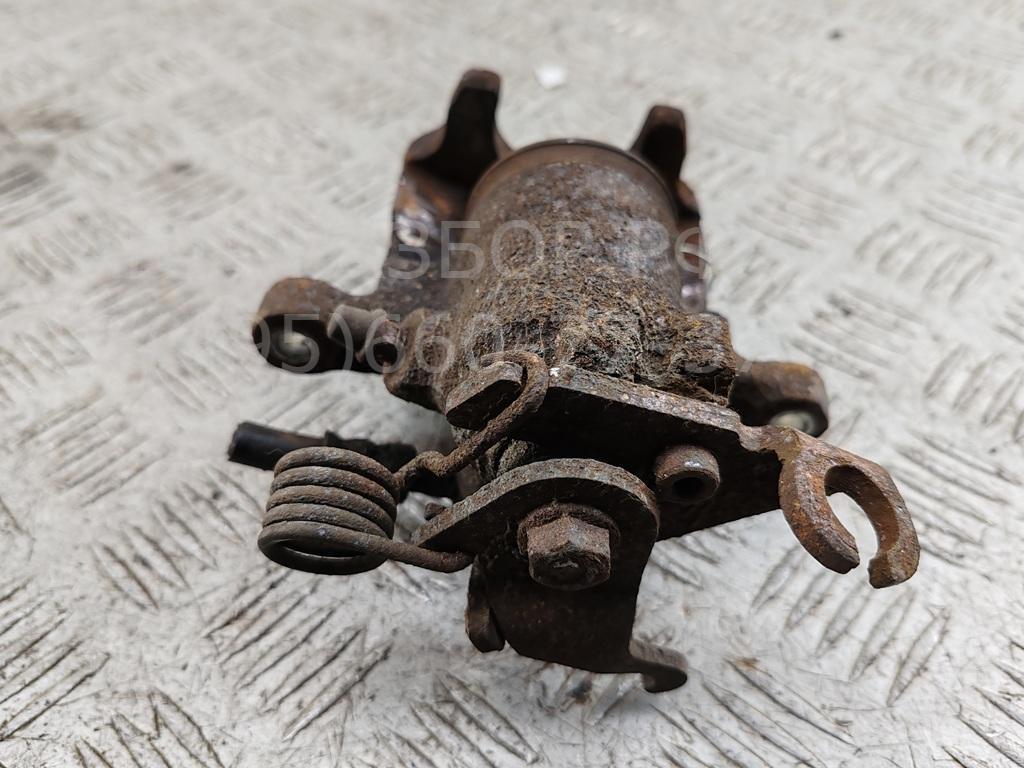 Суппорт задний левый