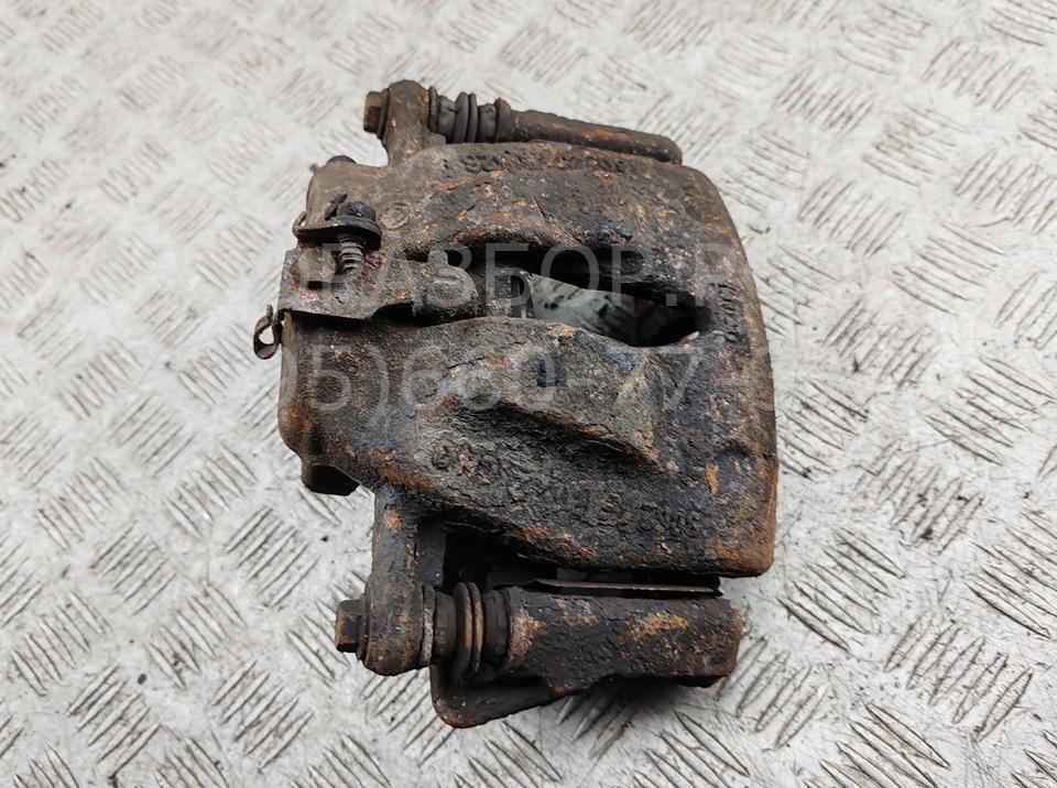 Суппорт передний левый