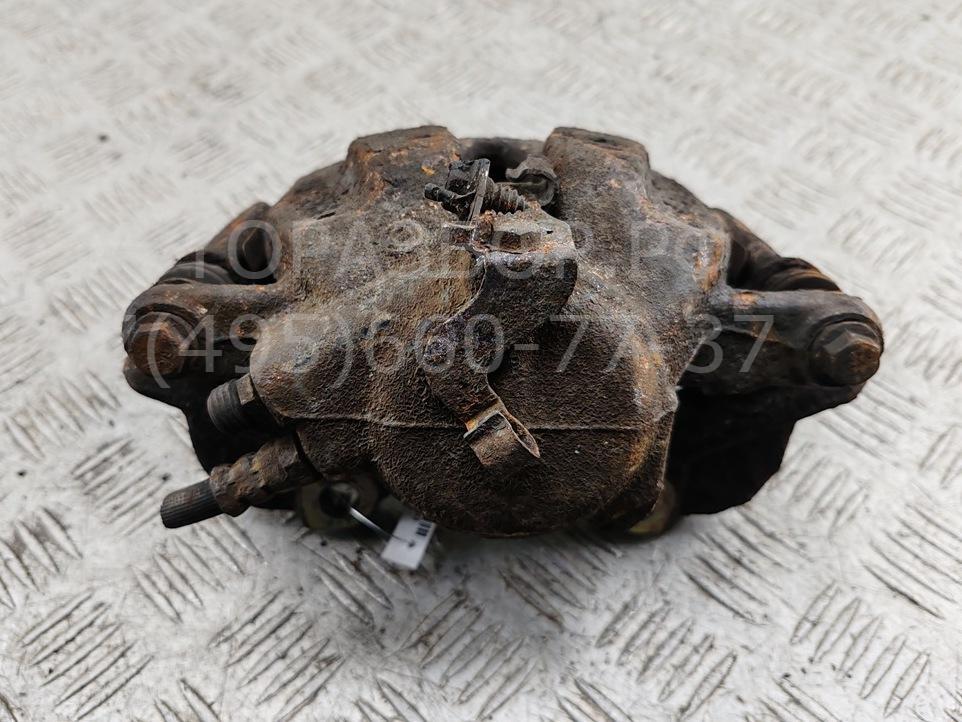 Суппорт передний левый