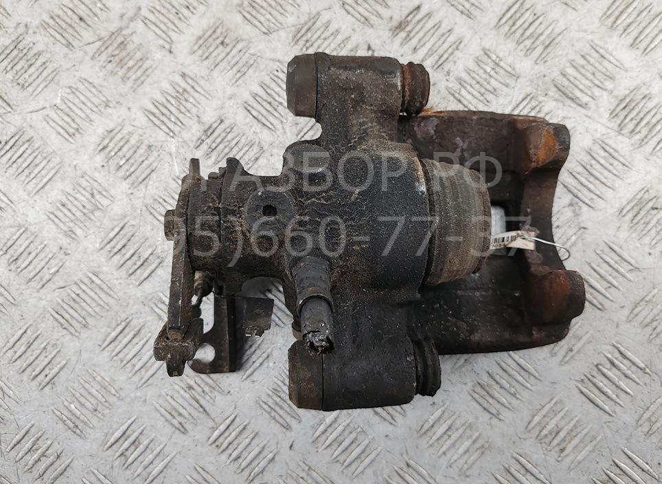 Суппорт задний левый