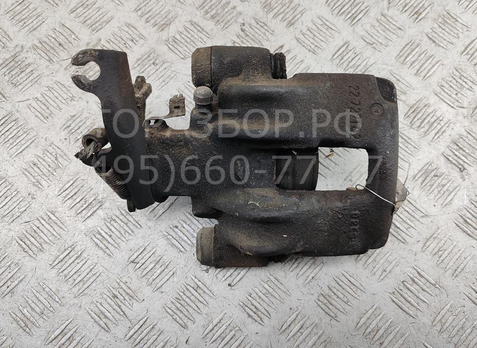 Суппорт задний левый