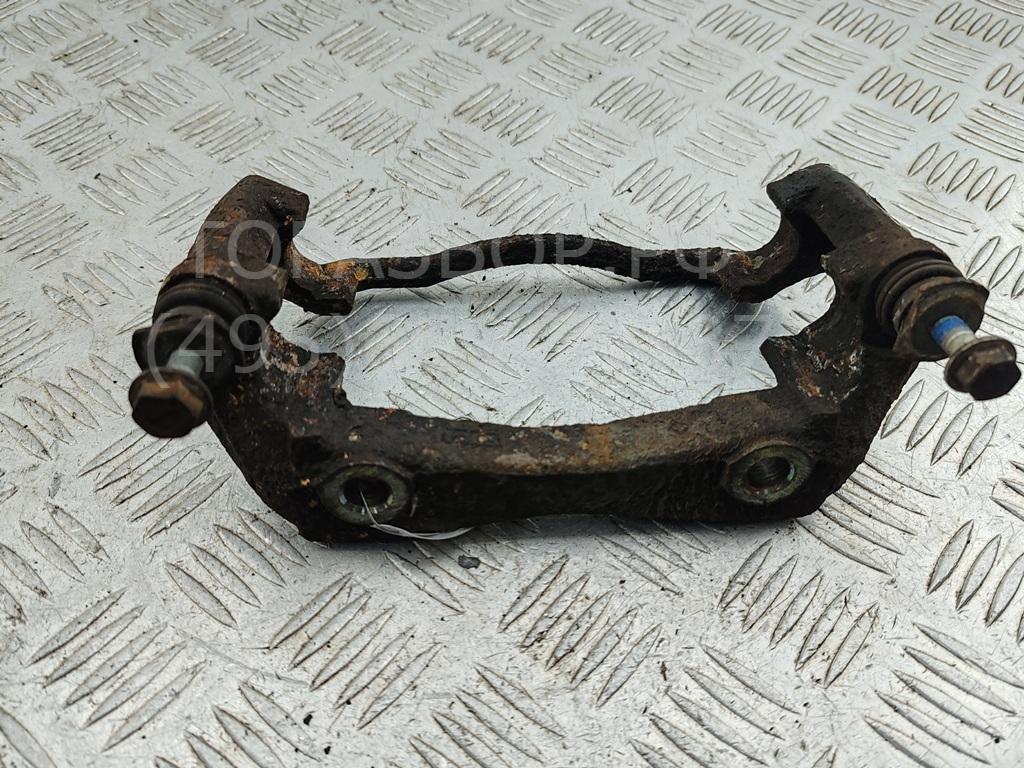 Скоба суппорта переднего