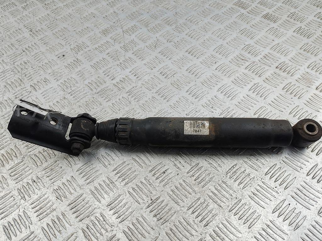 Амортизатор задний левый