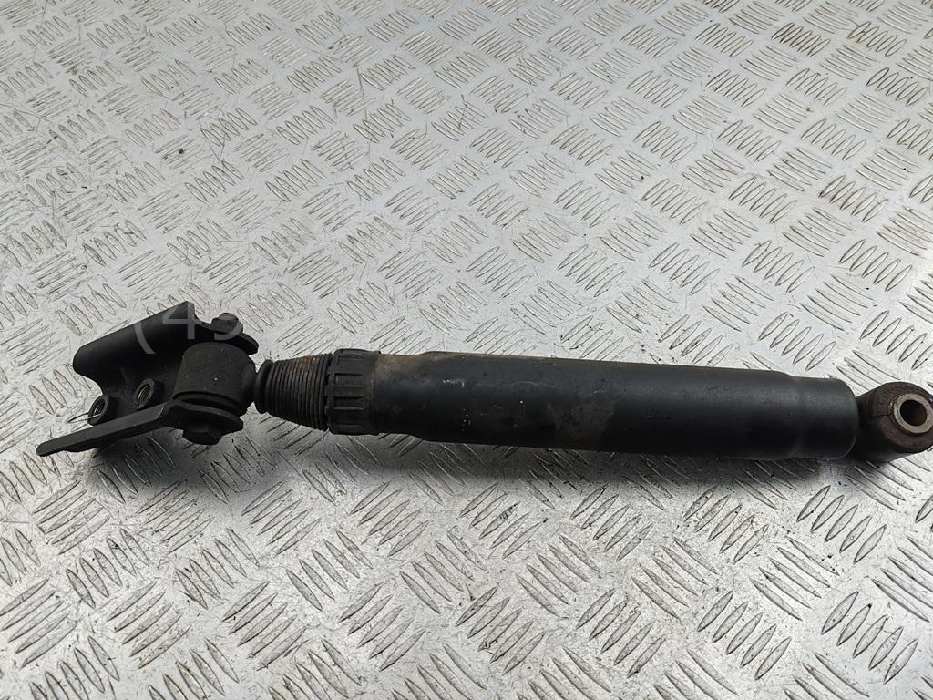 Амортизатор задний левый