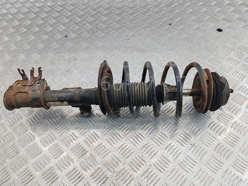 Амортизатор передний левый