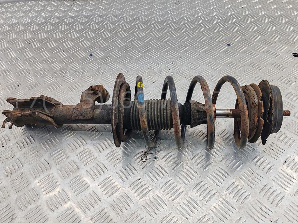 Амортизатор передний левый