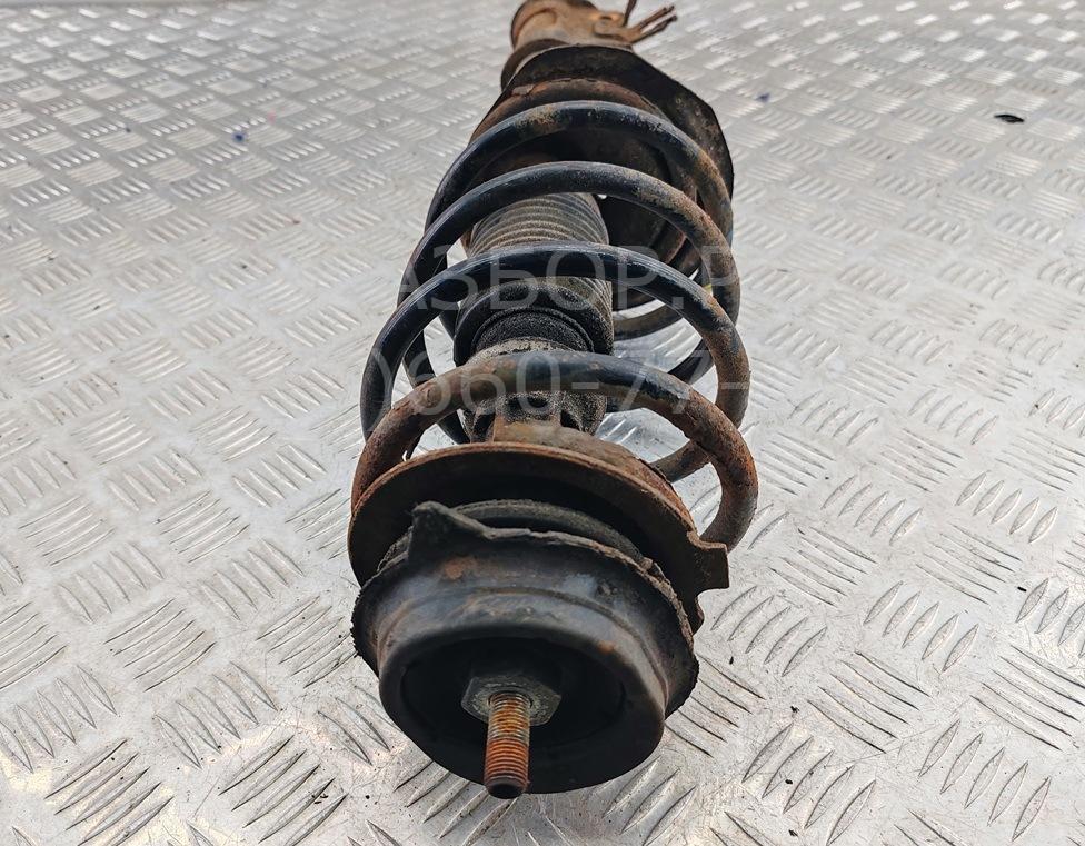 Амортизатор передний левый