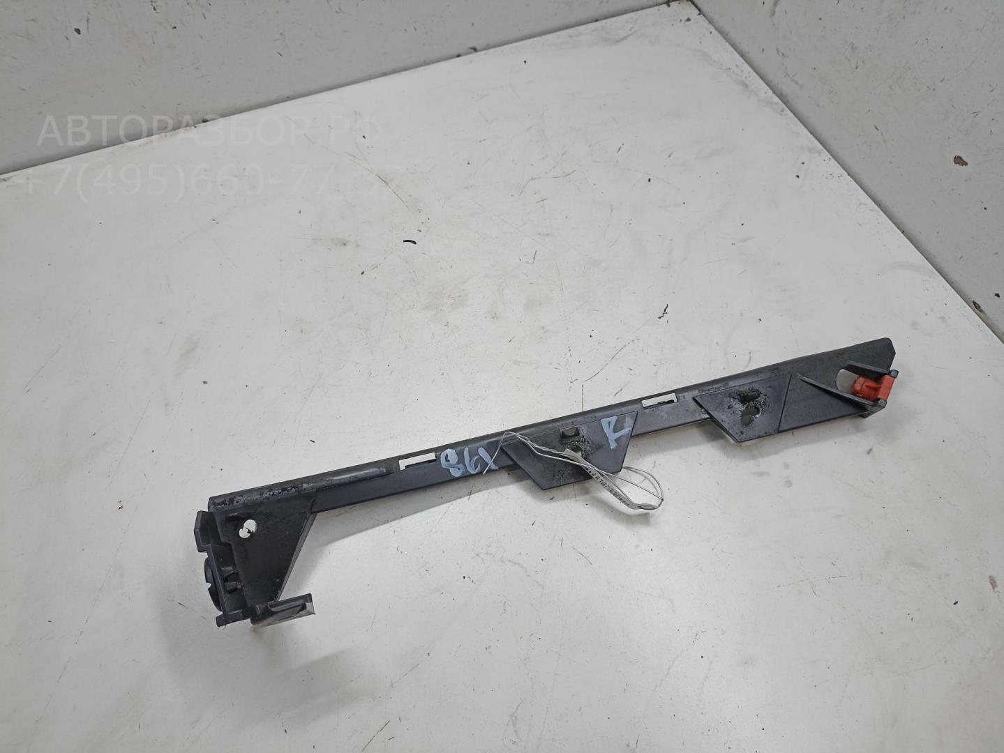 Кронштейн переднего бампера левый