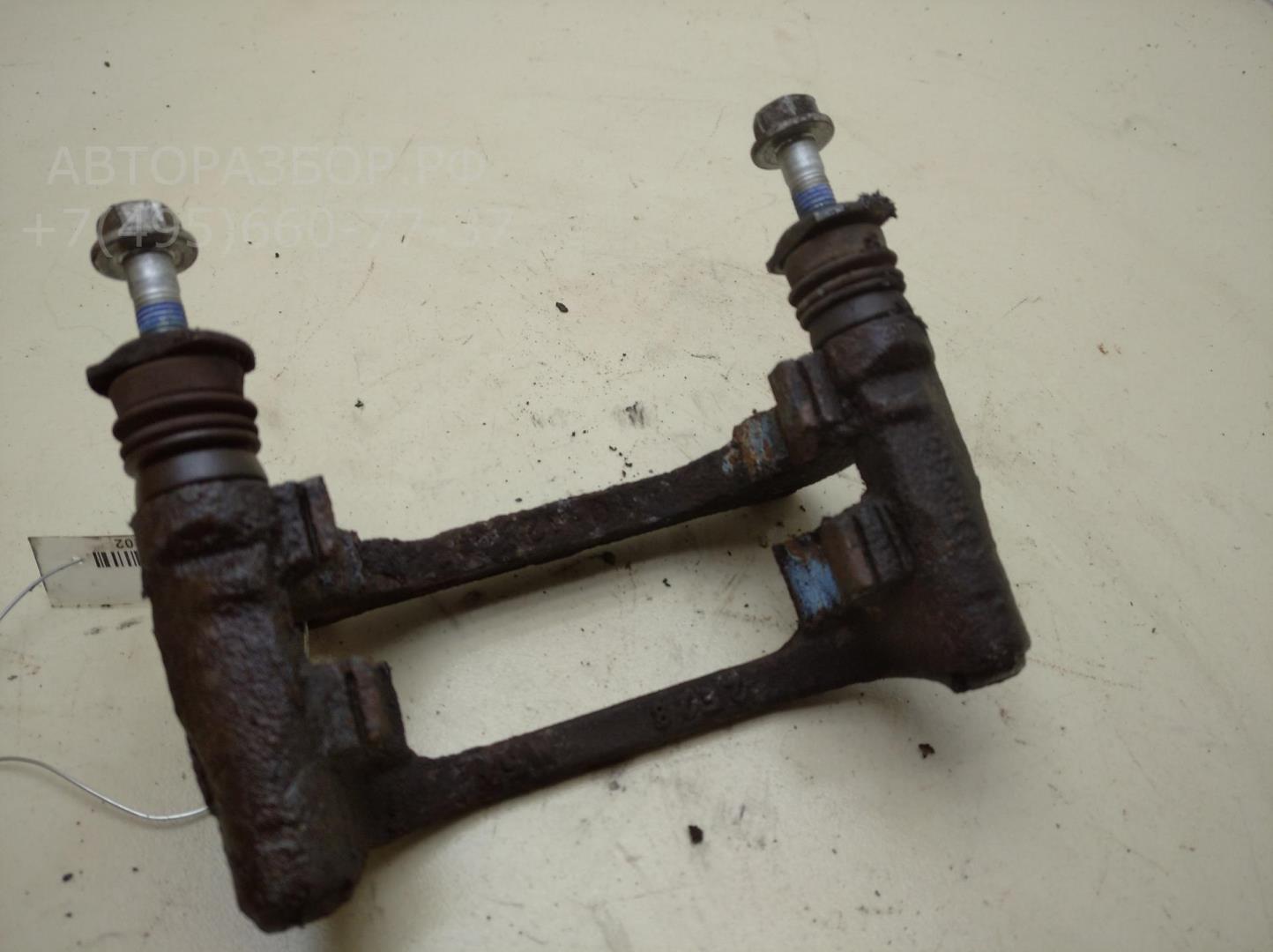 Скоба суппорта заднего