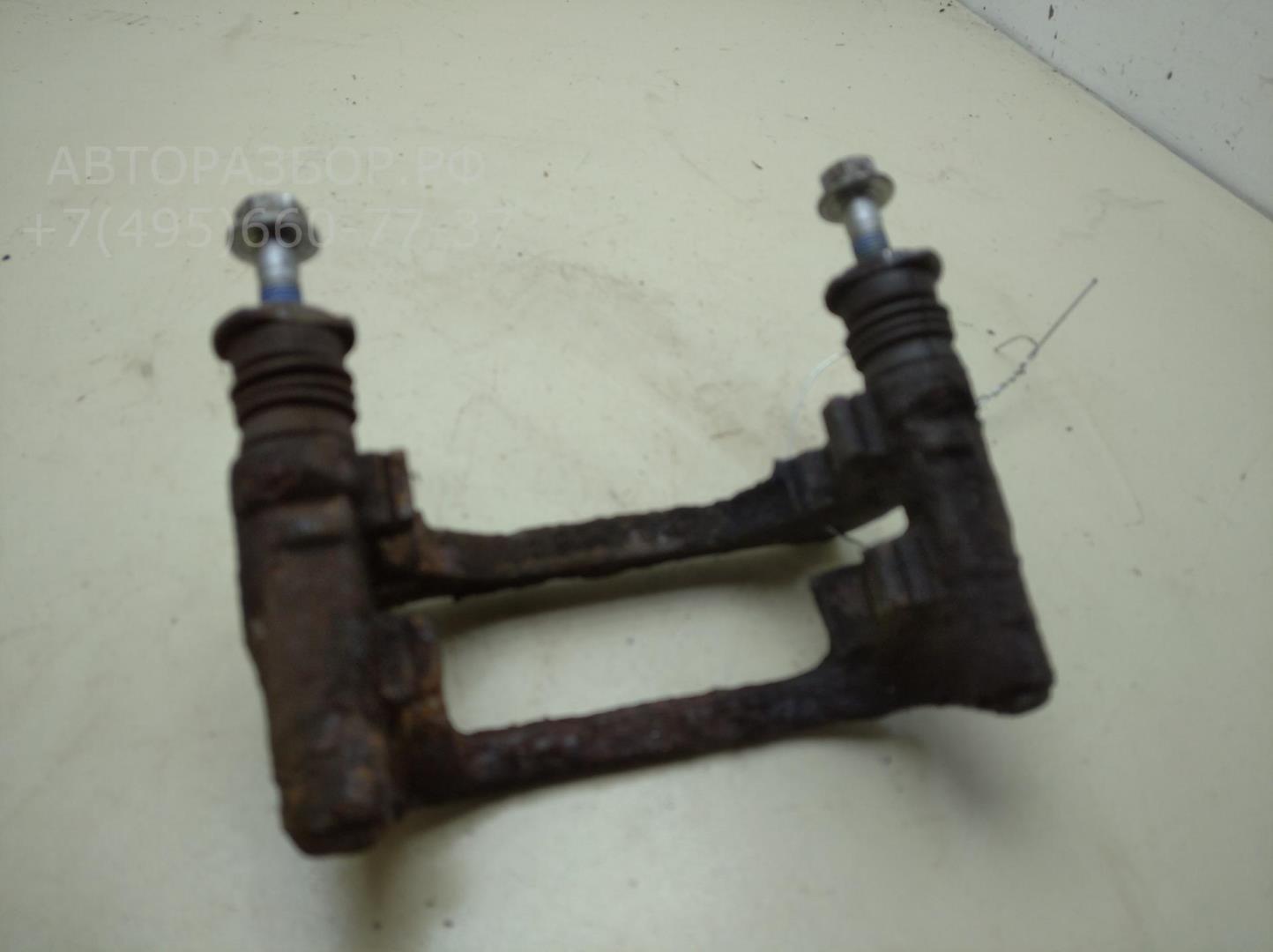 Скоба суппорта заднего