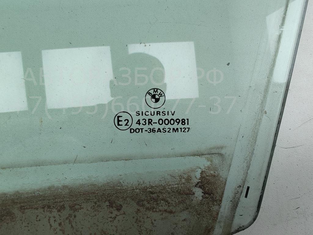 Стекло двери передней левой
