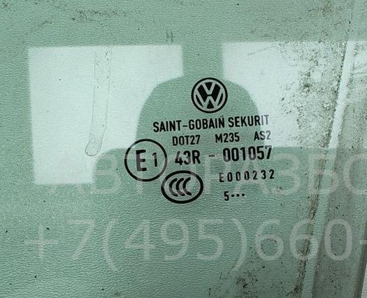 Стекло двери передней левой