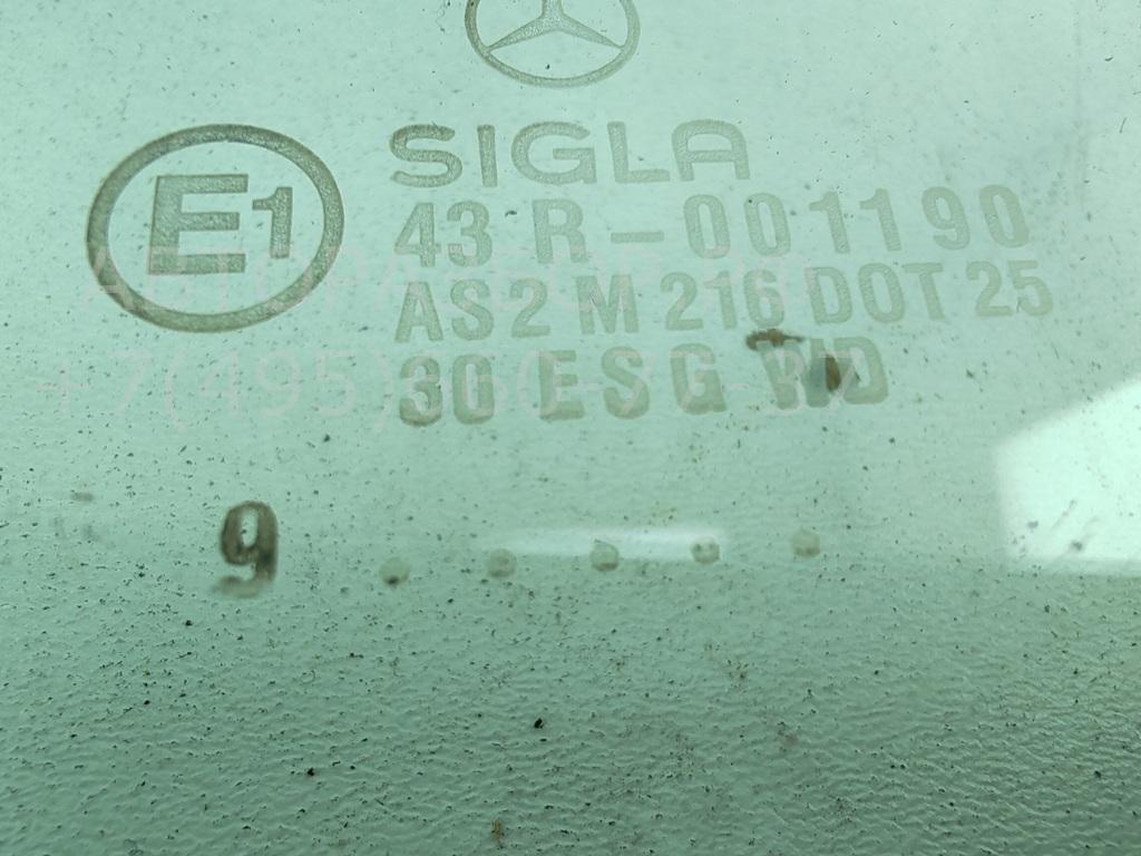 Стекло двери передней левой