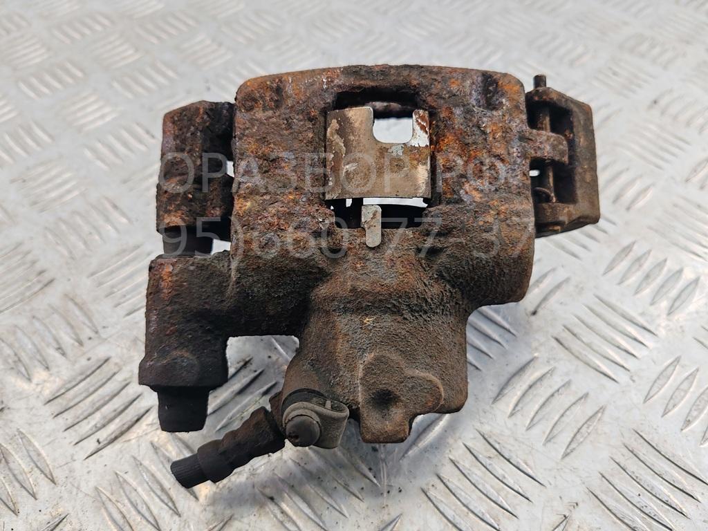 Суппорт передний левый