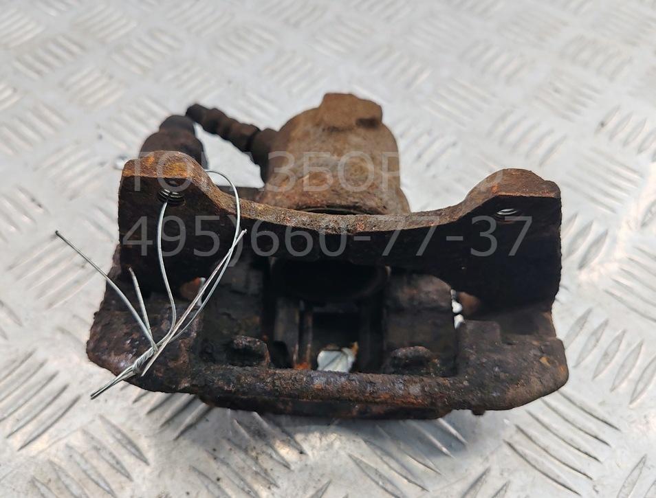 Суппорт передний левый