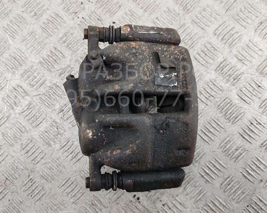 Суппорт передний левый