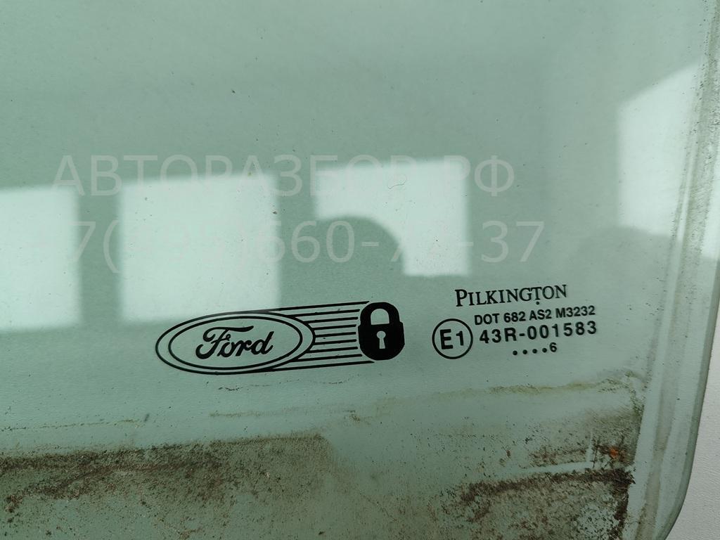 Стекло двери передней левой