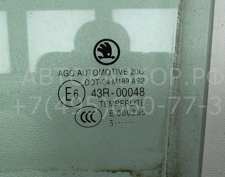 Стекло двери задней левой