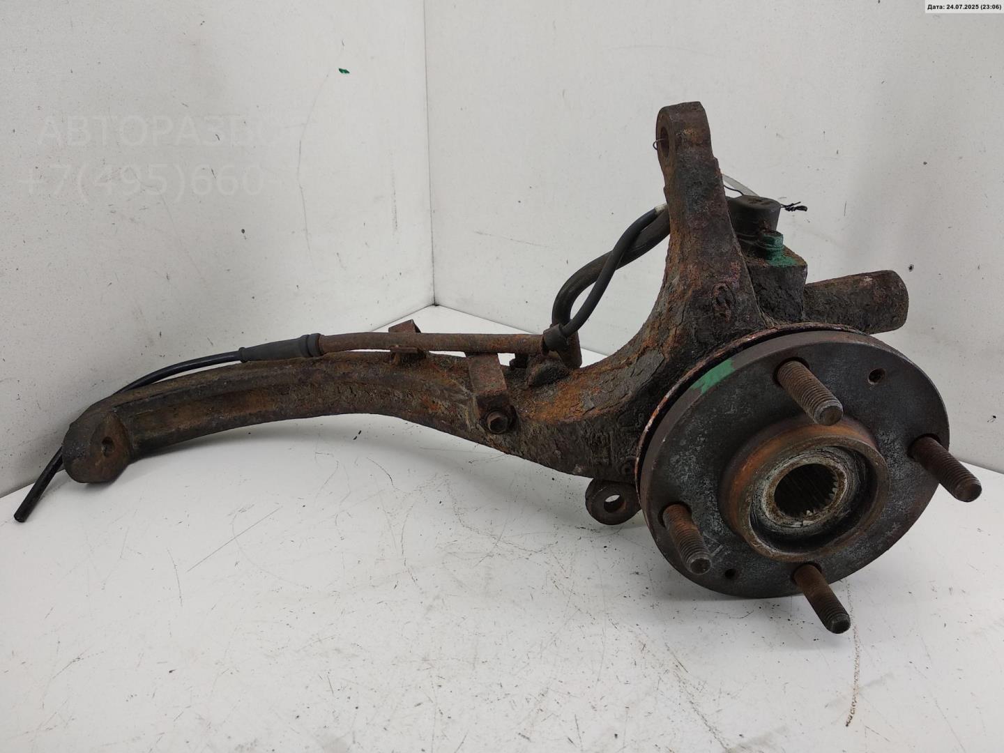 Кулак поворотный передний левый