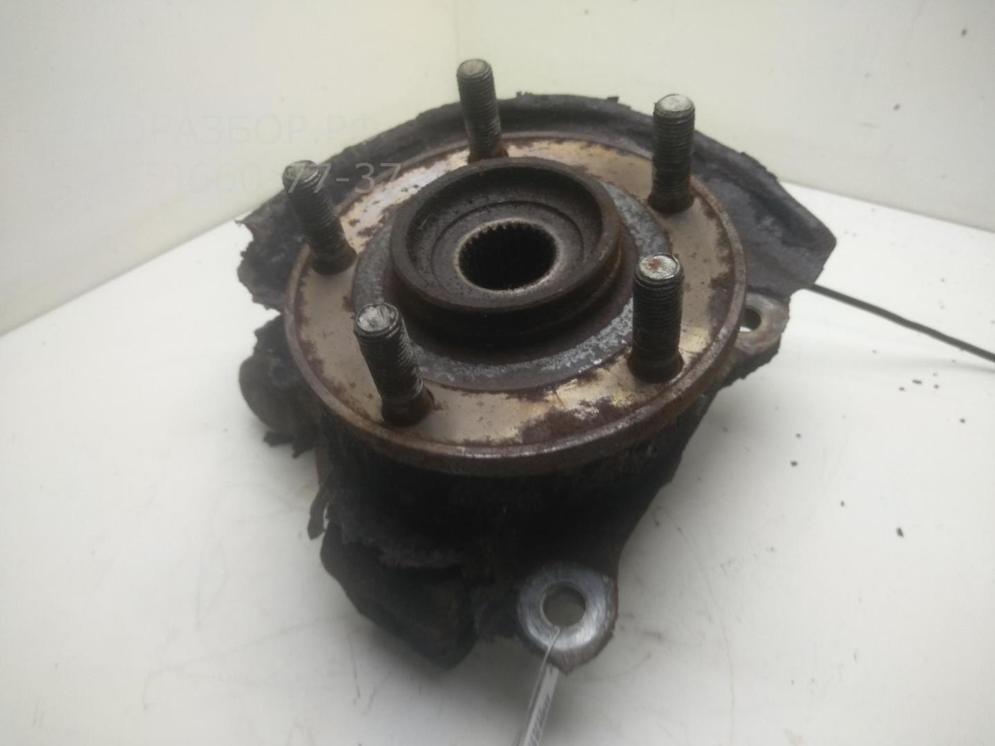 Кулак поворотный передний левый