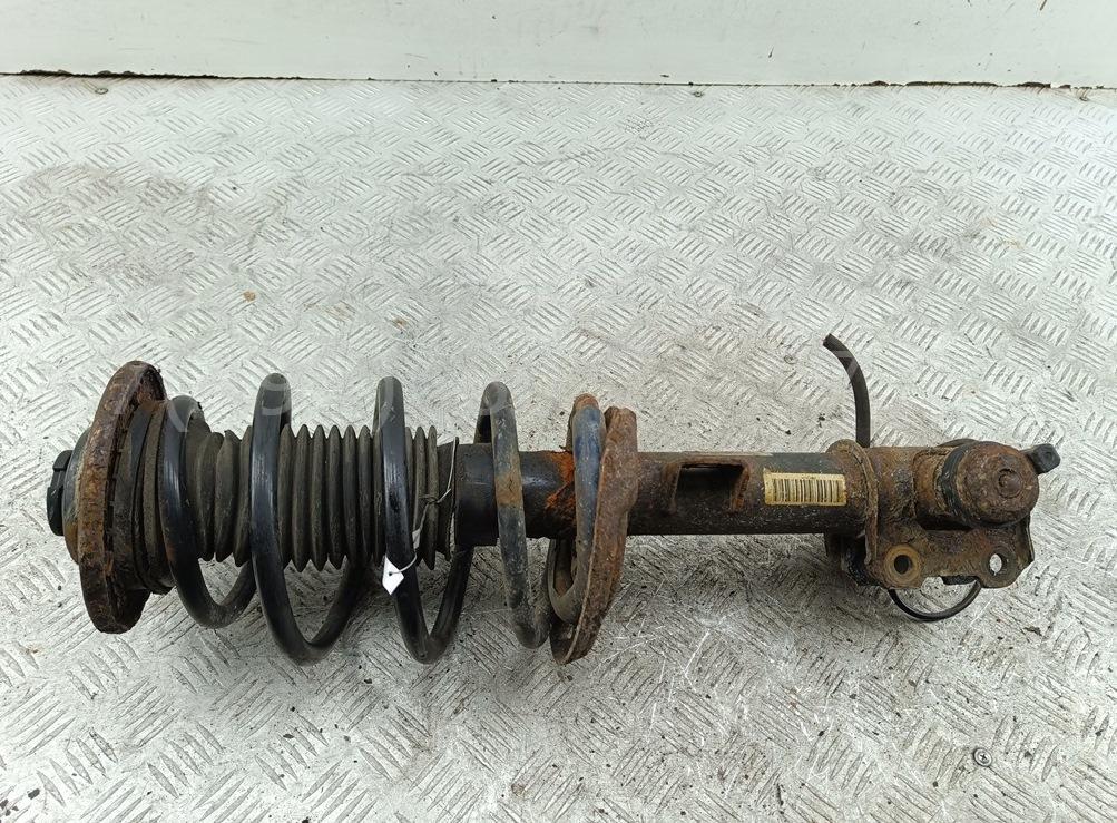 Амортизатор передний левый