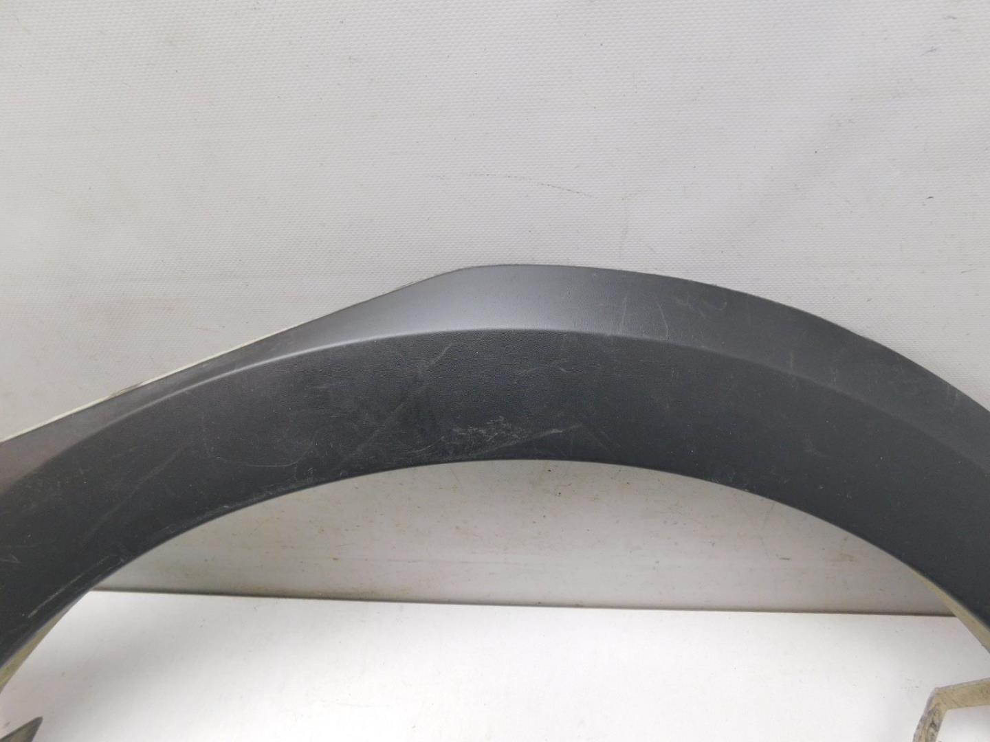 Накладка заднего крыла левого