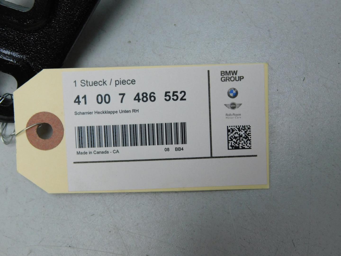 Петля двери багажника