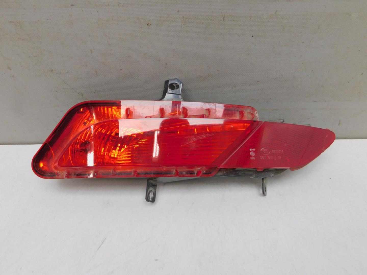 Фонарь задний в бампер левый