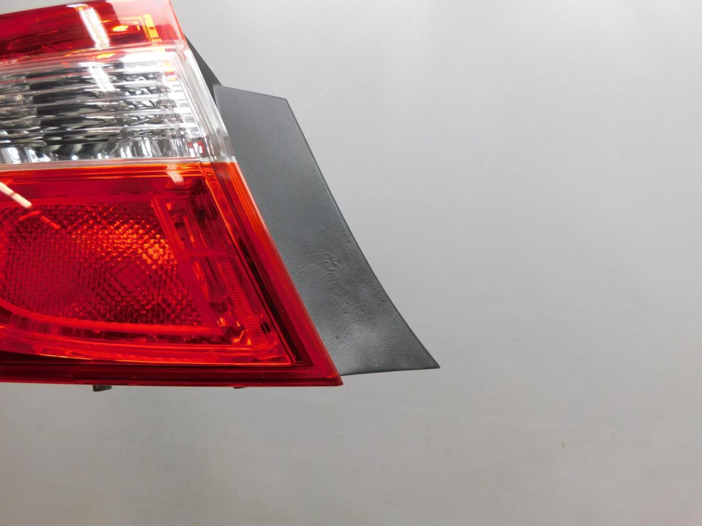 Фонарь задний наружный левый