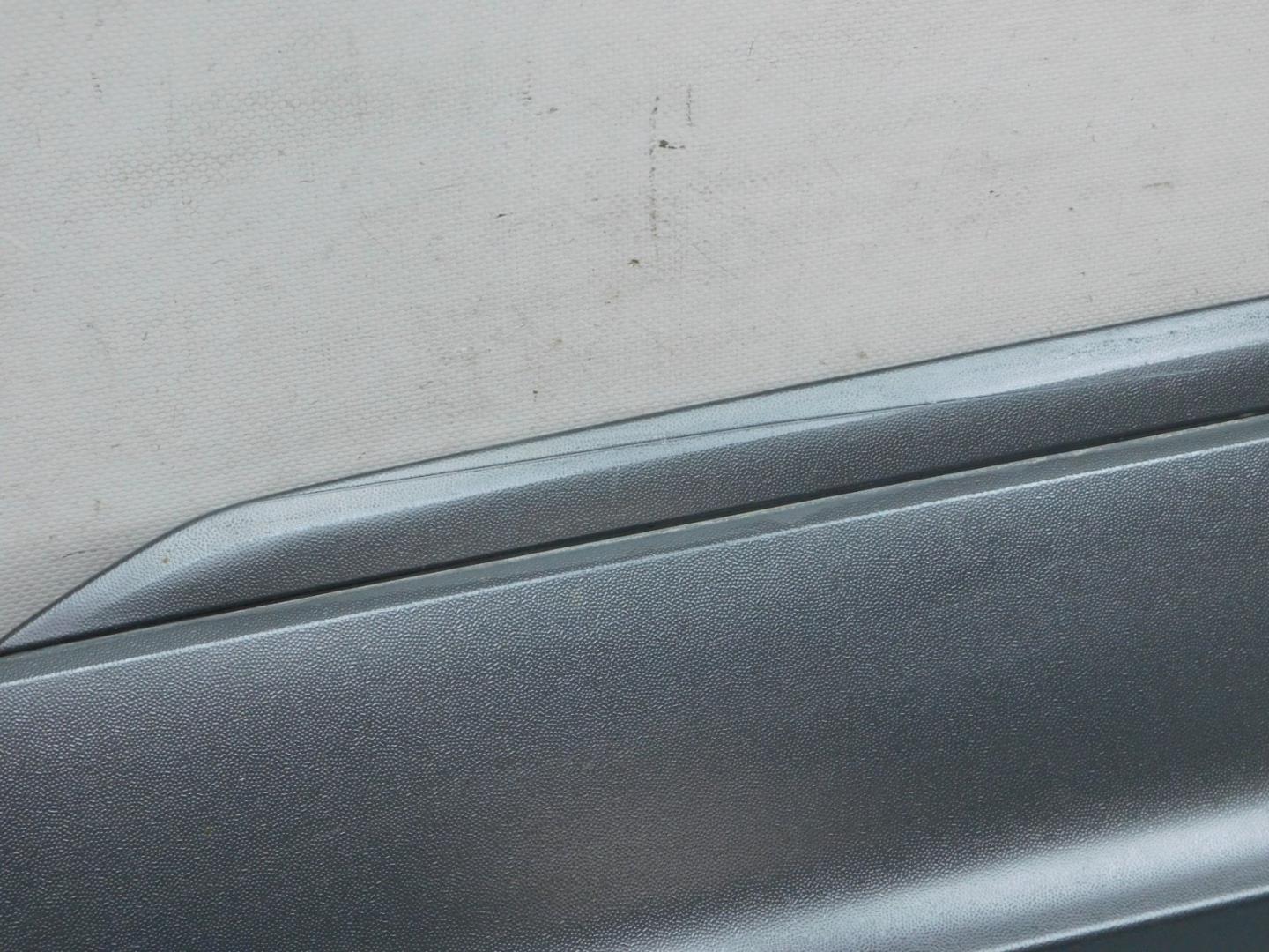 Накладка двери передней левой