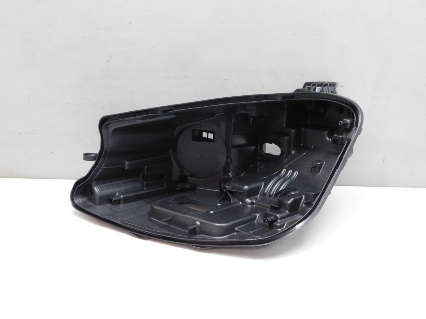 Корпус фары левой