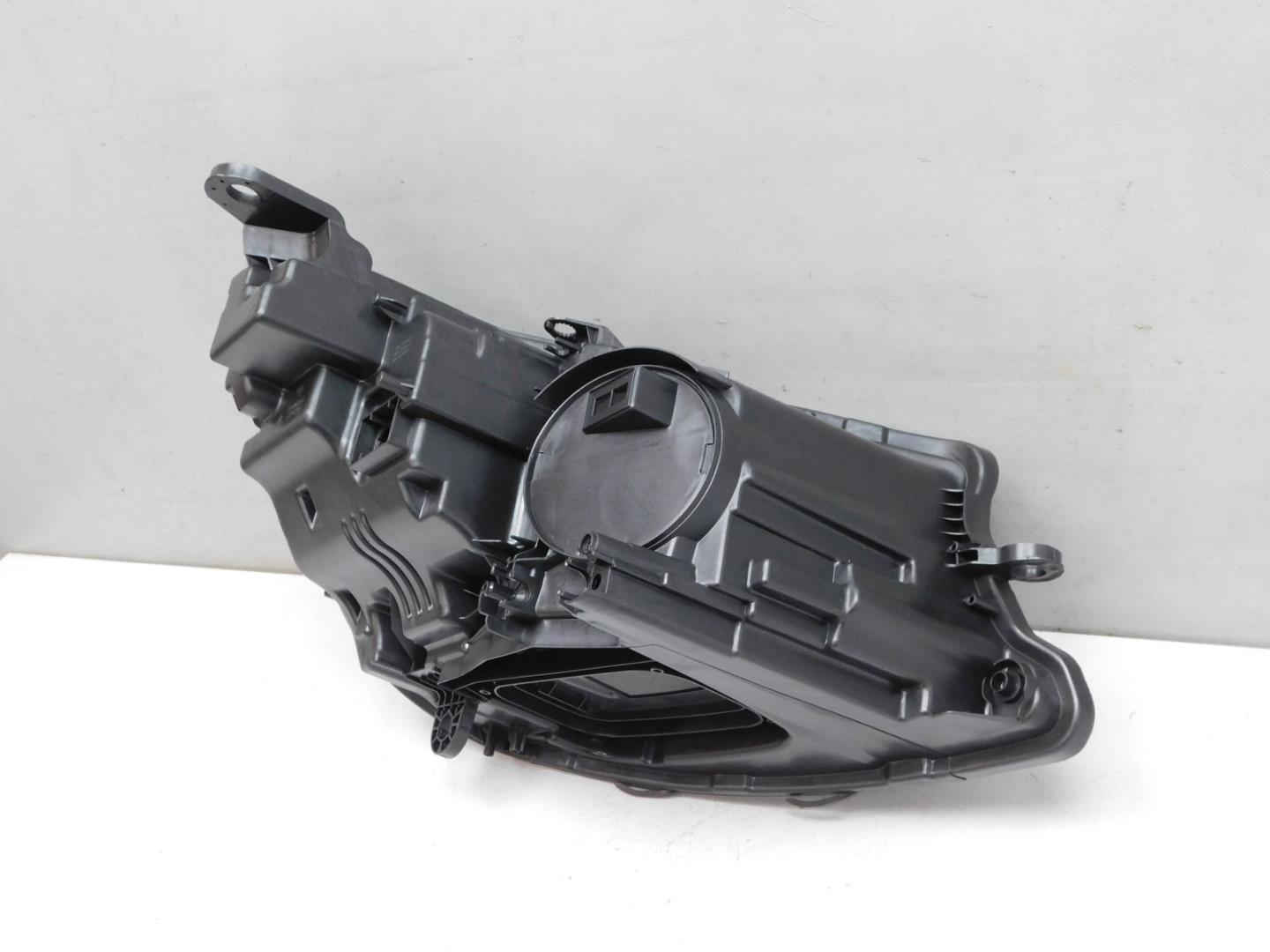 Корпус фары левой