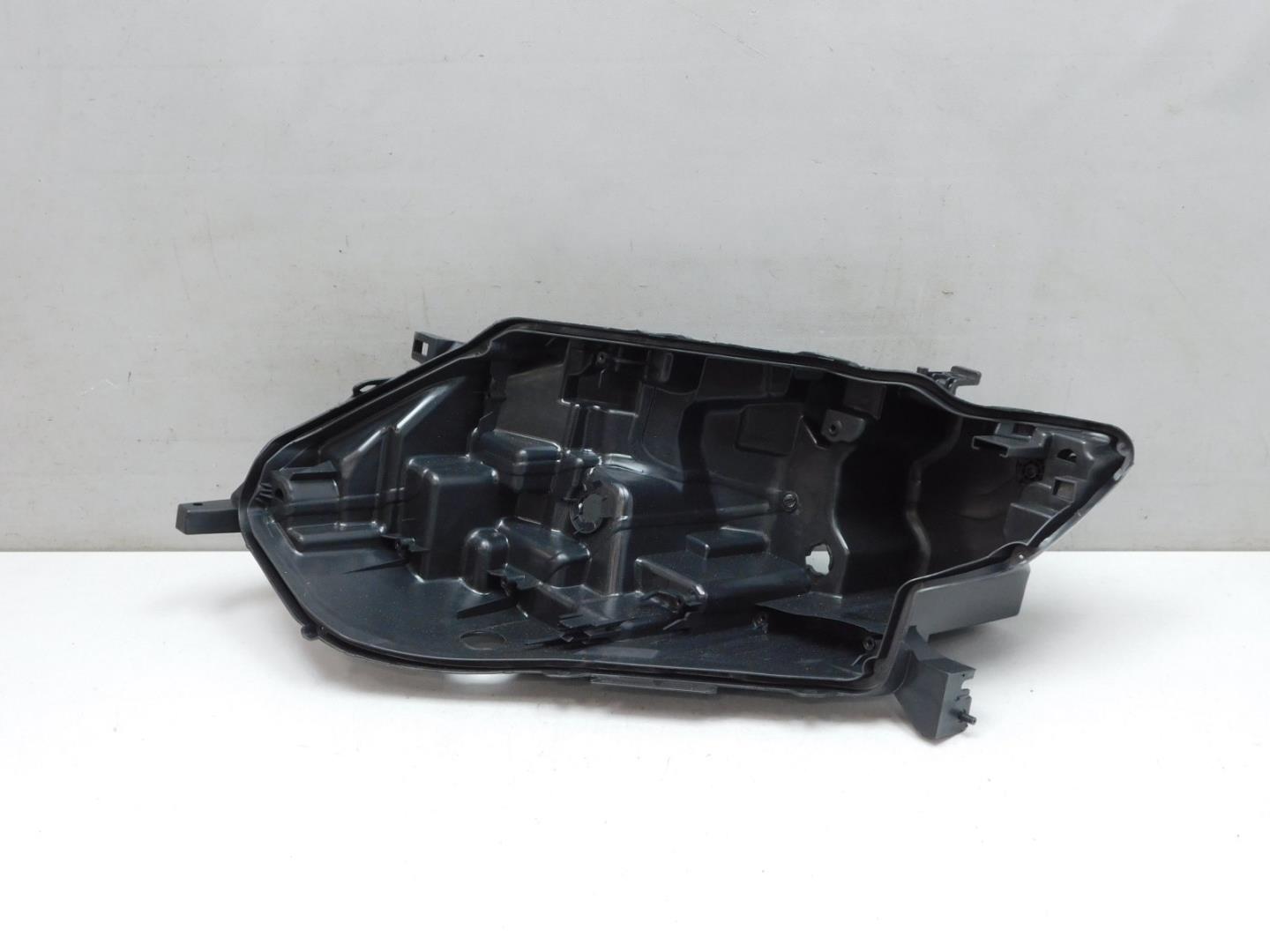 Корпус фары левой