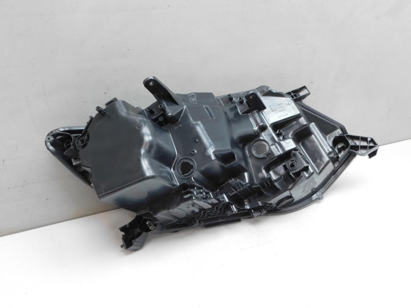 Корпус фары левой