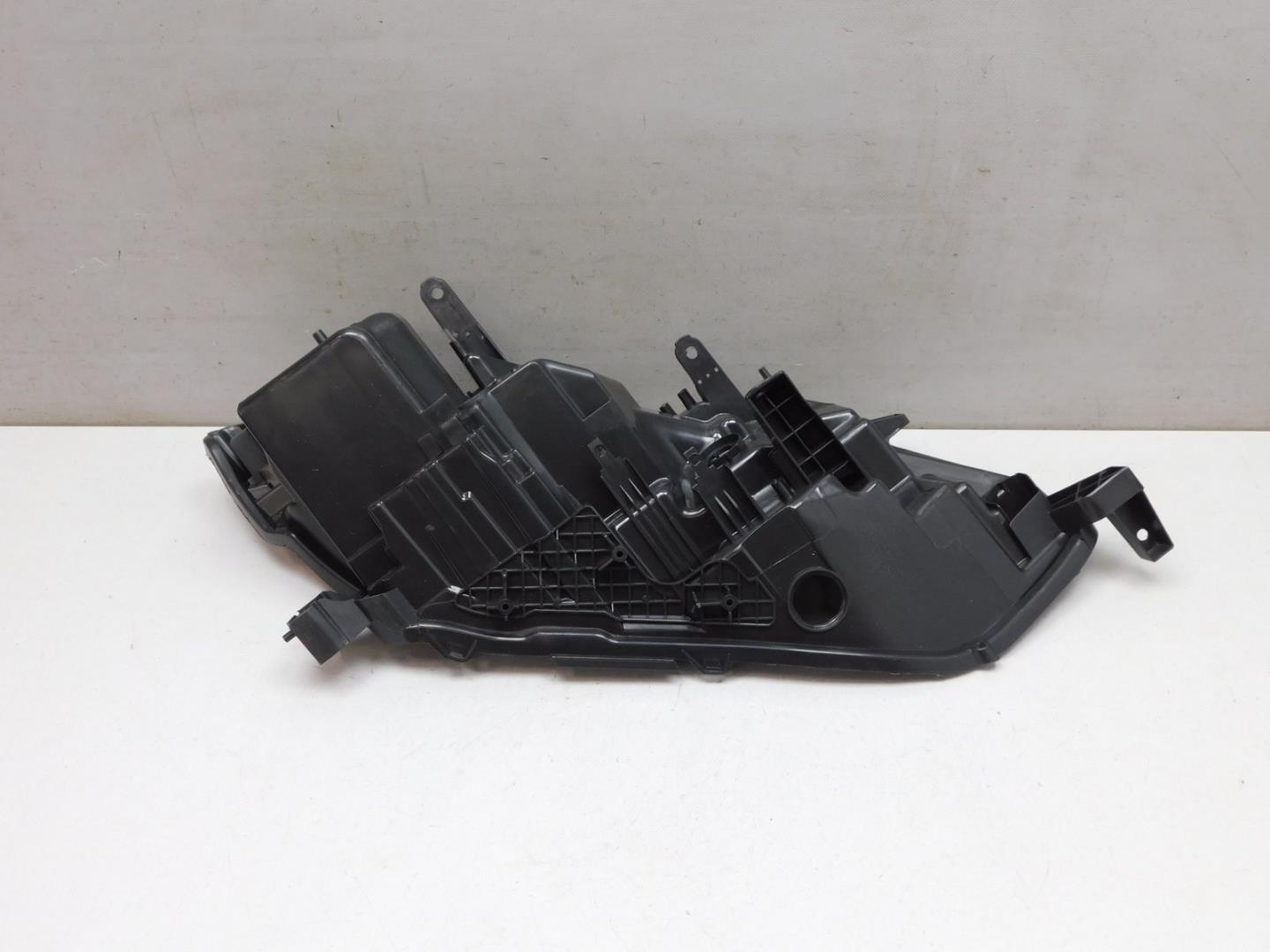 Корпус фары левой