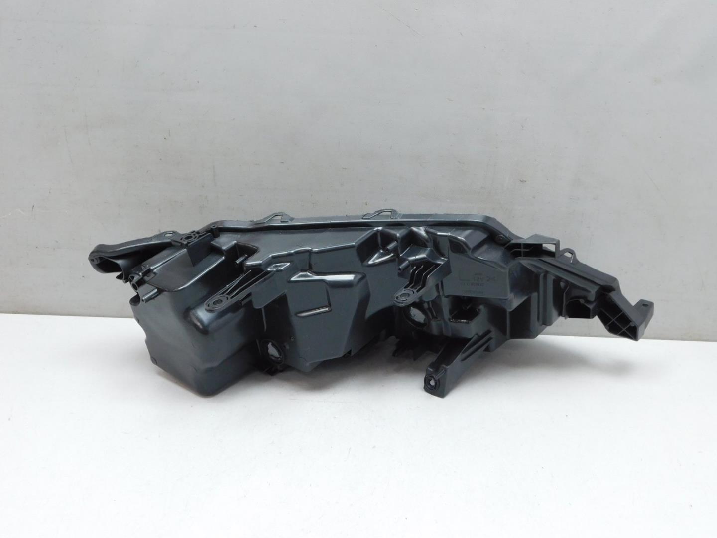 Корпус фары левой