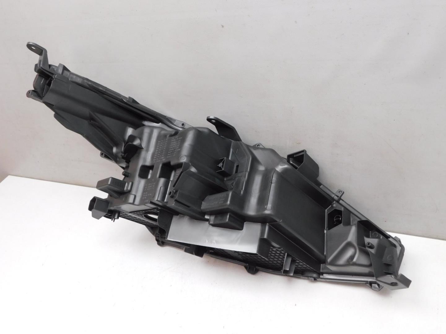 Корпус фары левой