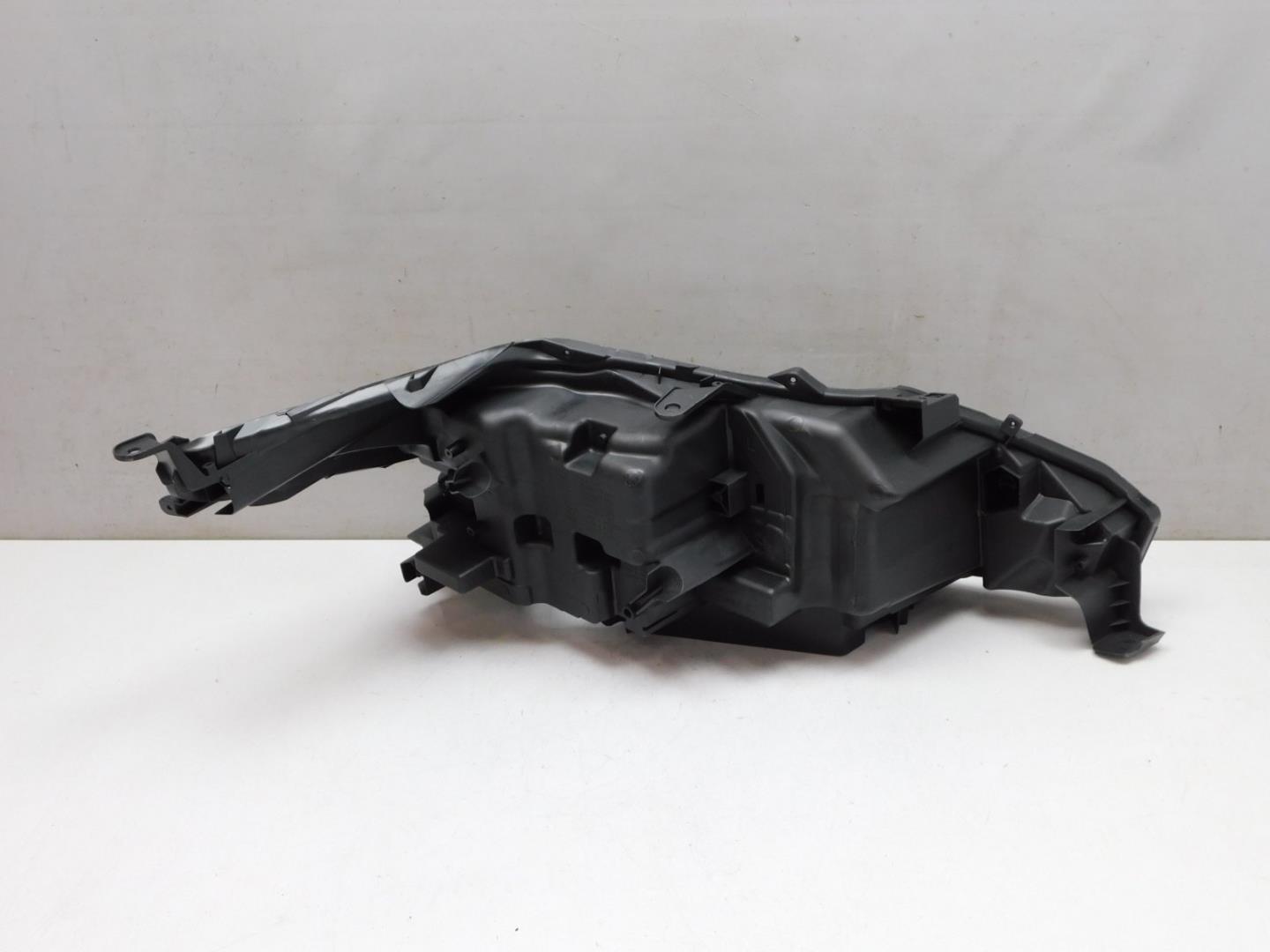 Корпус фары левой