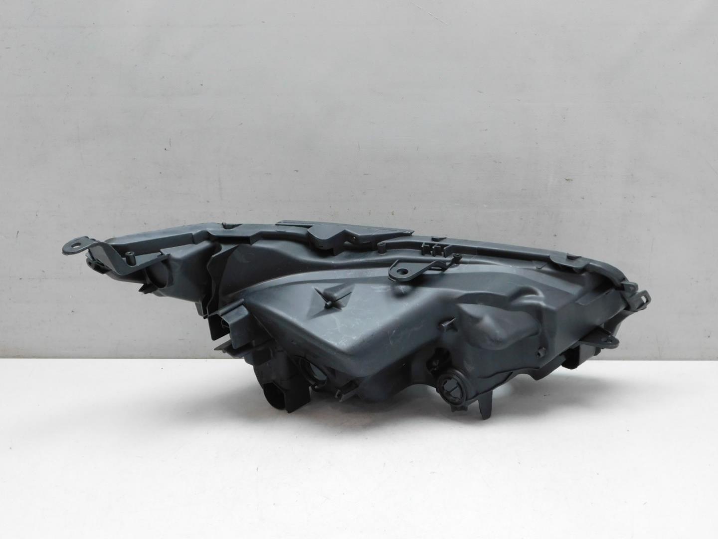 Корпус фары левой