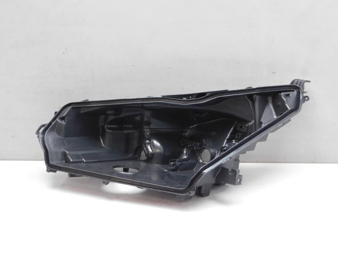 Корпус фары левой