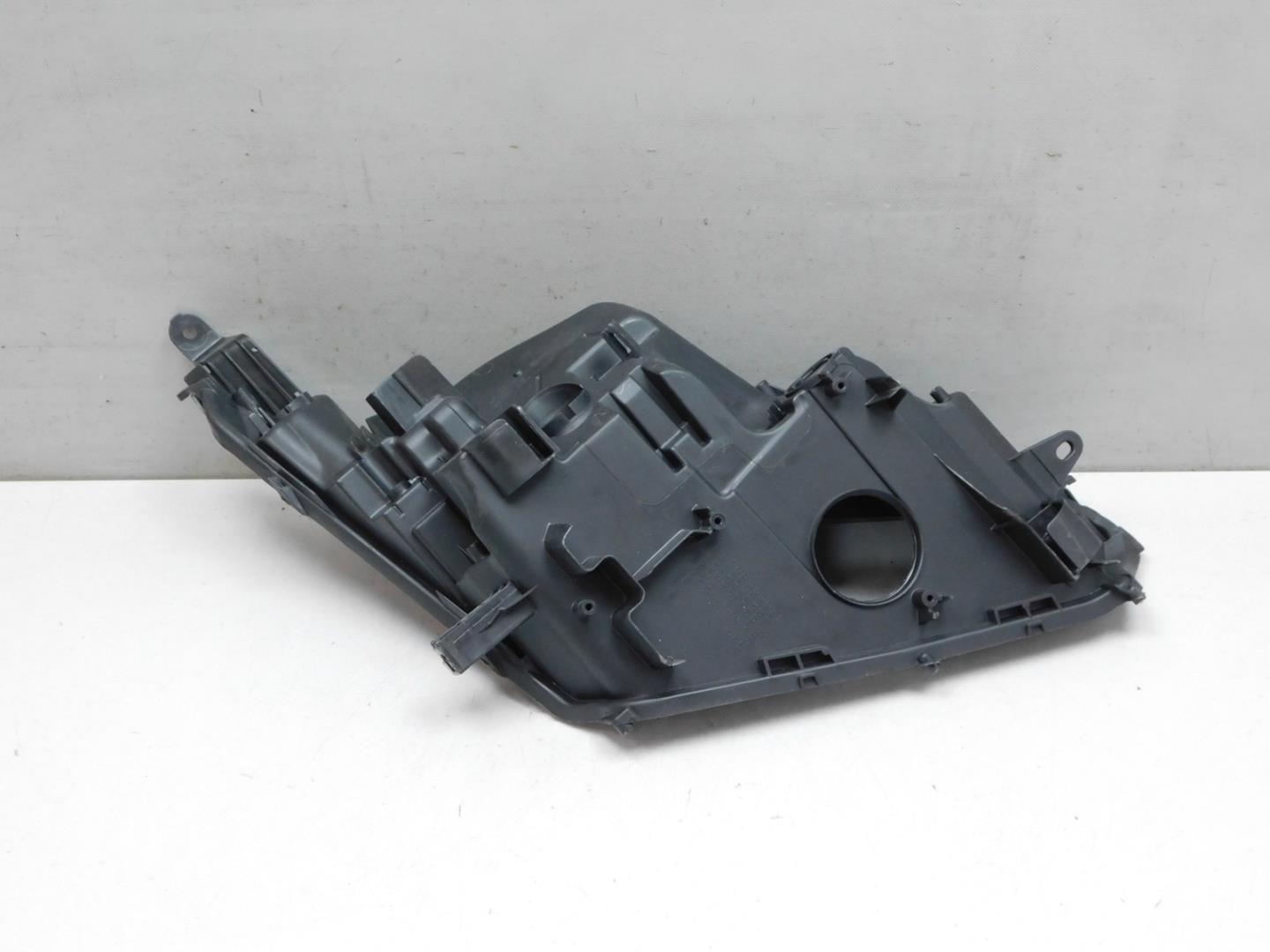 Корпус фары левой