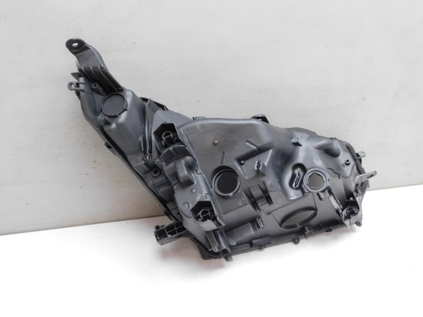 Корпус фары левой