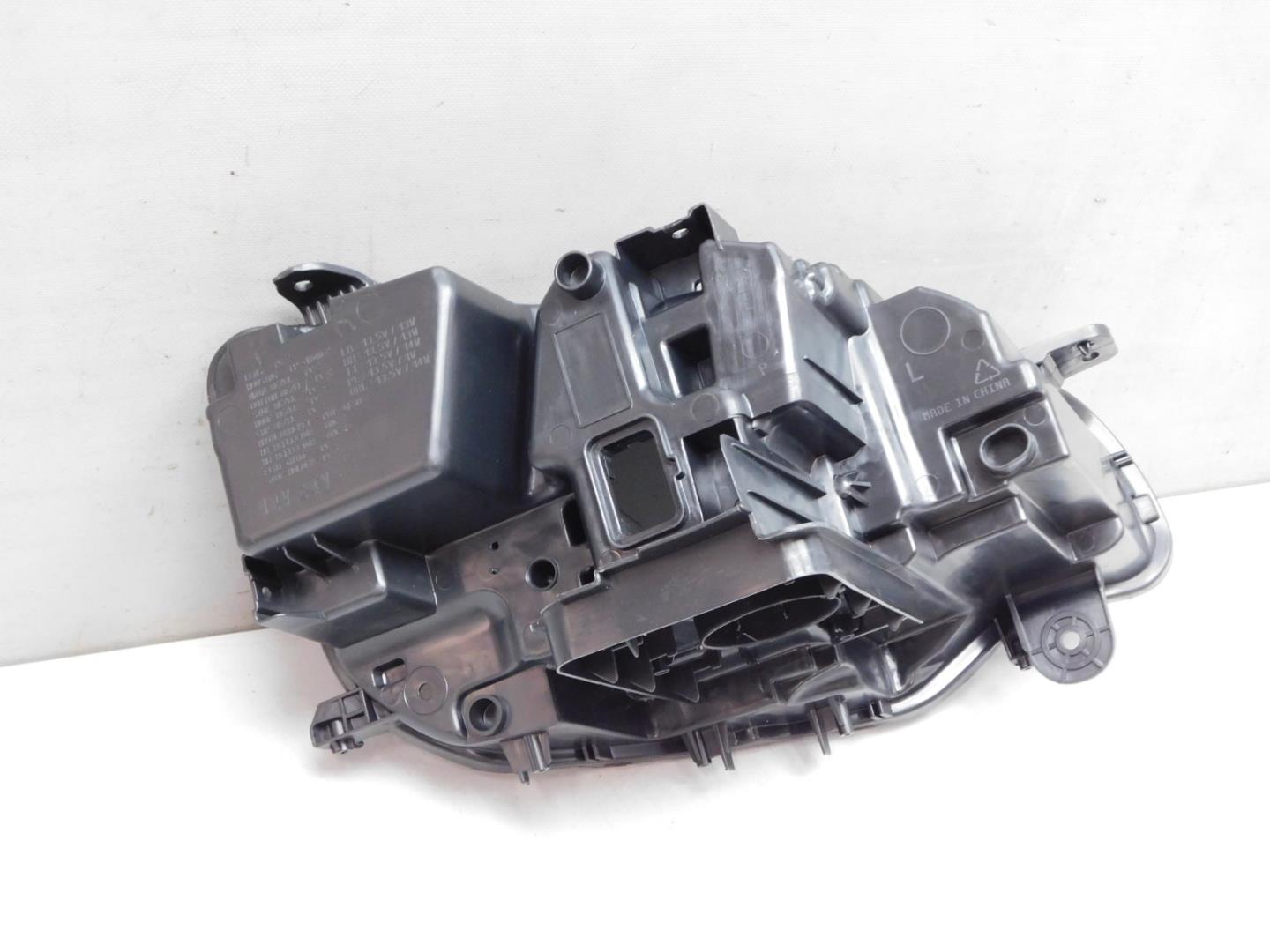 Корпус фары левой