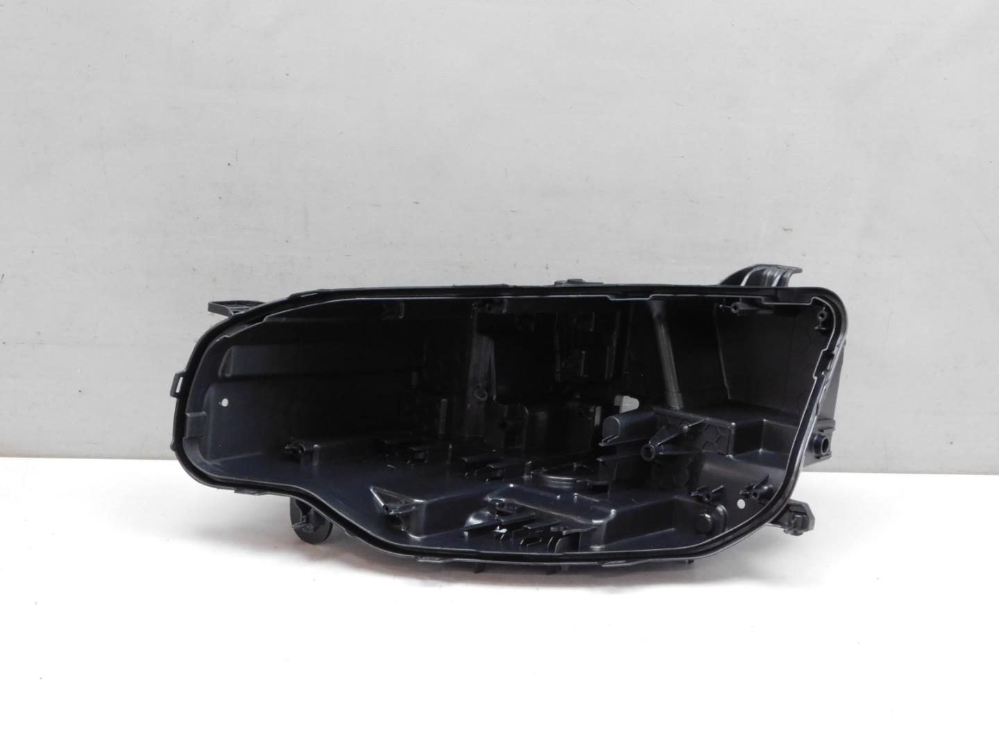 Корпус фары левой