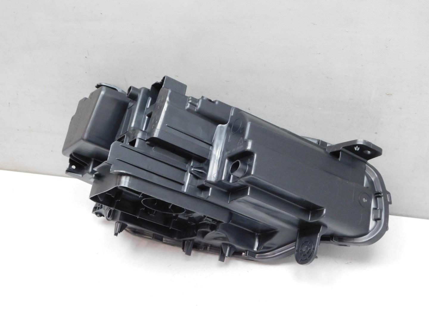 Корпус фары левой